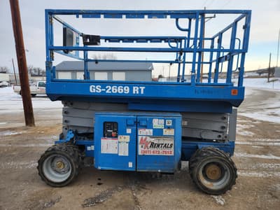 2013 Genie GS 2669 RT Scissor Lift - Image 1